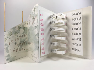 Front side of folded book on stilts